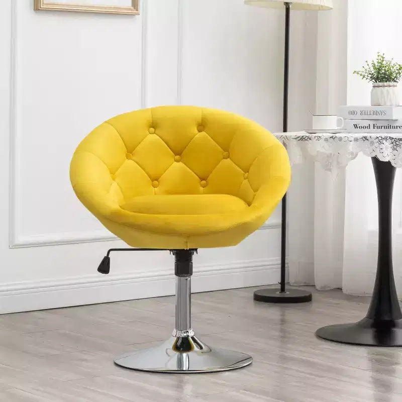 Poltroncina girevole in velluto giallo trapuntato, 1 posto