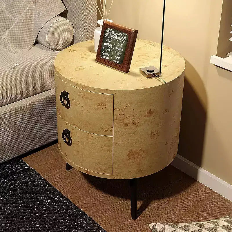 Tavolino rotondo, venatura del legno beige e gambe in metallo nero, 2 cassetti, uso singolo